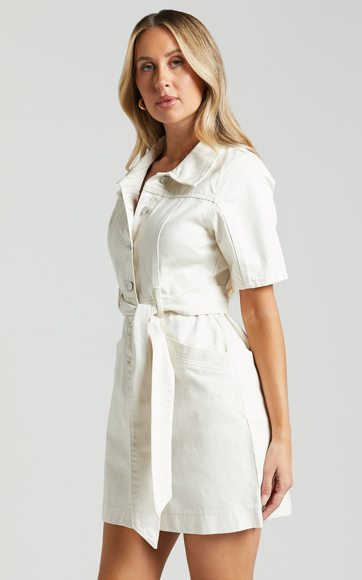 Women's denim button-down mini dress for effortless autumn style. Perfect casual everyday fall fashion.