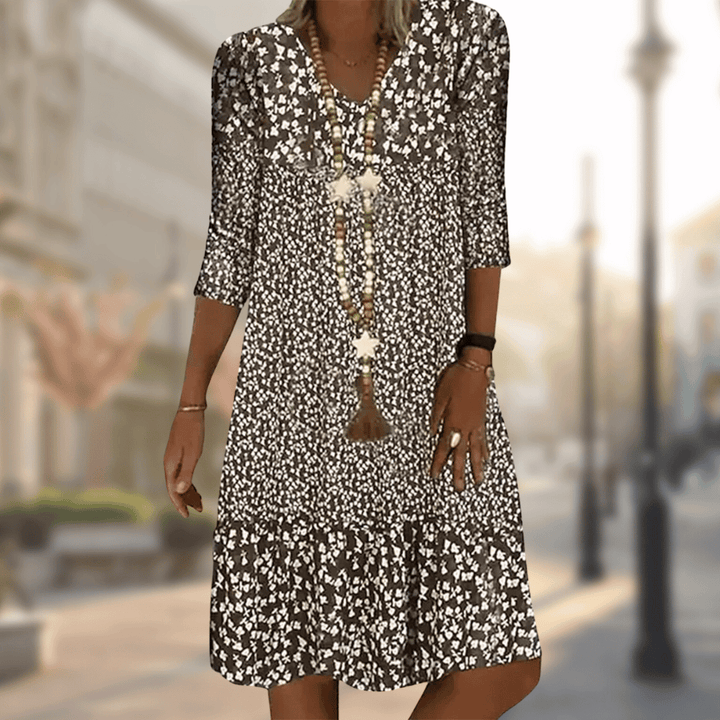 Versatile women's Soleil summer dress, elegant for daytime casual or evening events. Flattering knee-length design.