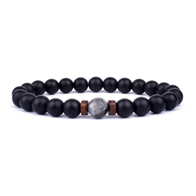 Women's elegant stone bracelet, a sophisticated black gemstone accessory for versatile fashion.