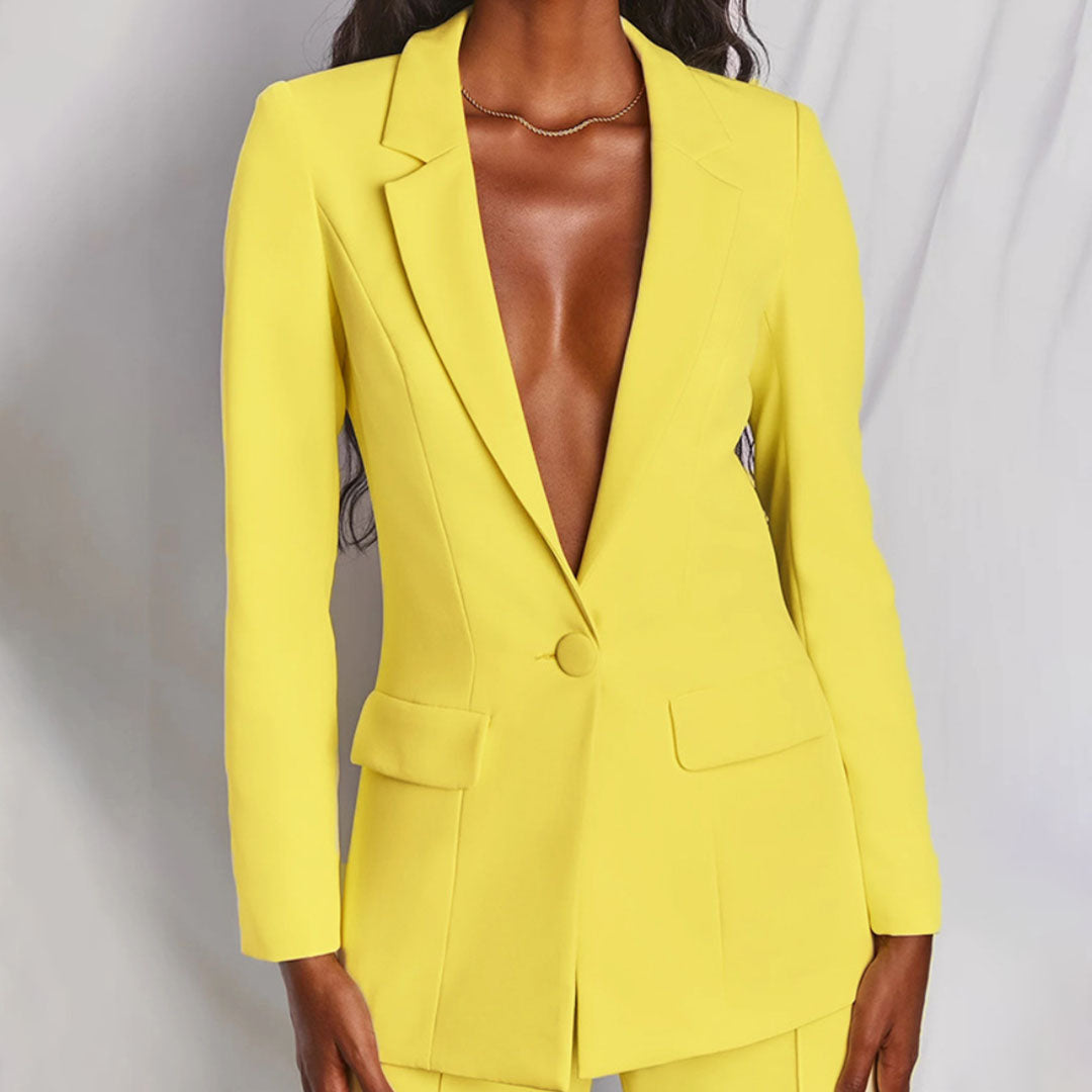 Effortless women's matching blazer & trousers. Stylish formal business attire.