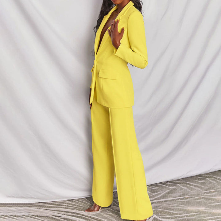 Elegant women's blazer and trouser set. Perfect for professional wear & chic office style.