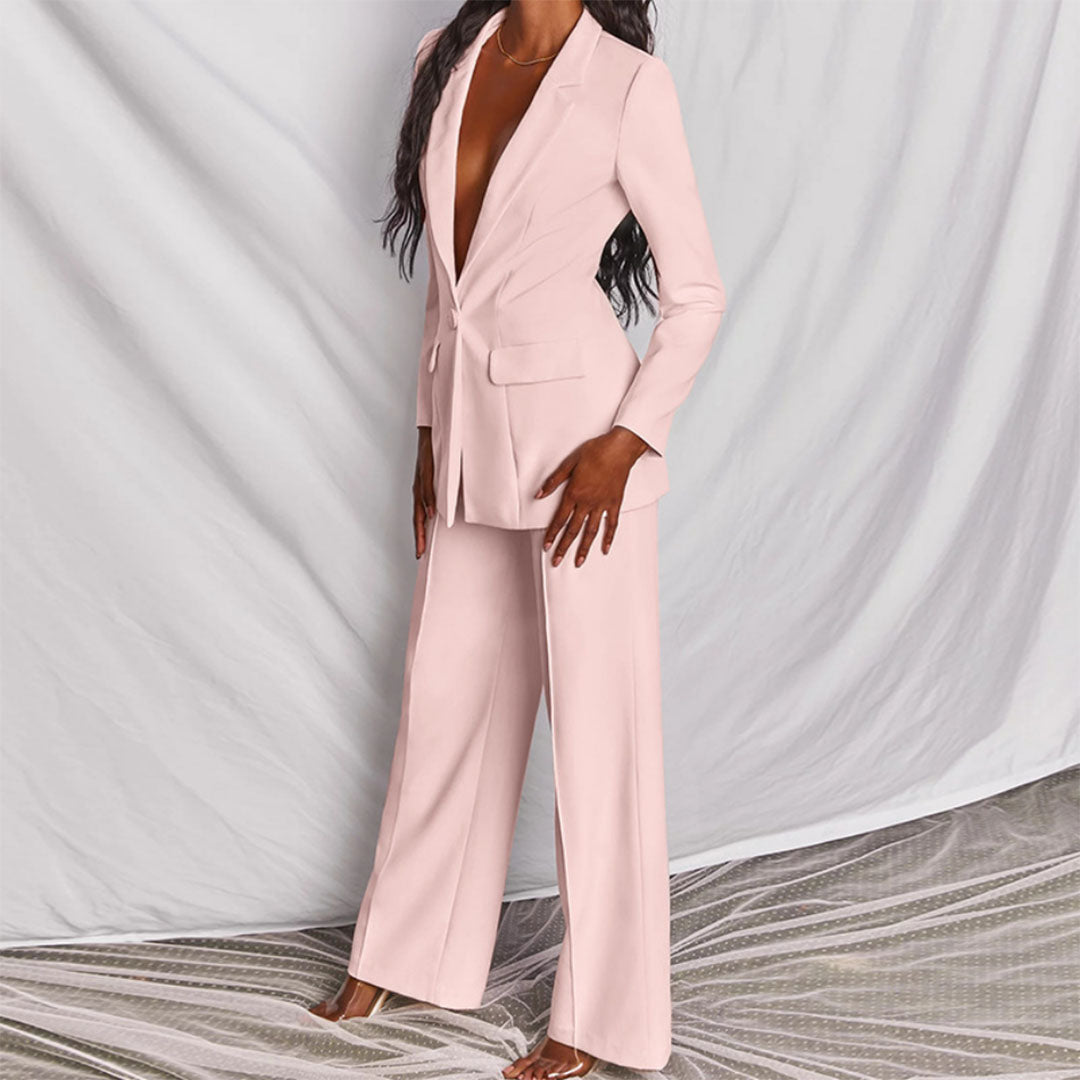 Women's elegant matching set. Modern blazer & trousers suitable for business or casual wear.