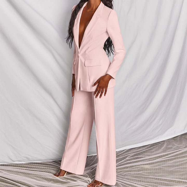 Women's elegant matching set. Modern blazer & trousers suitable for business or casual wear.
