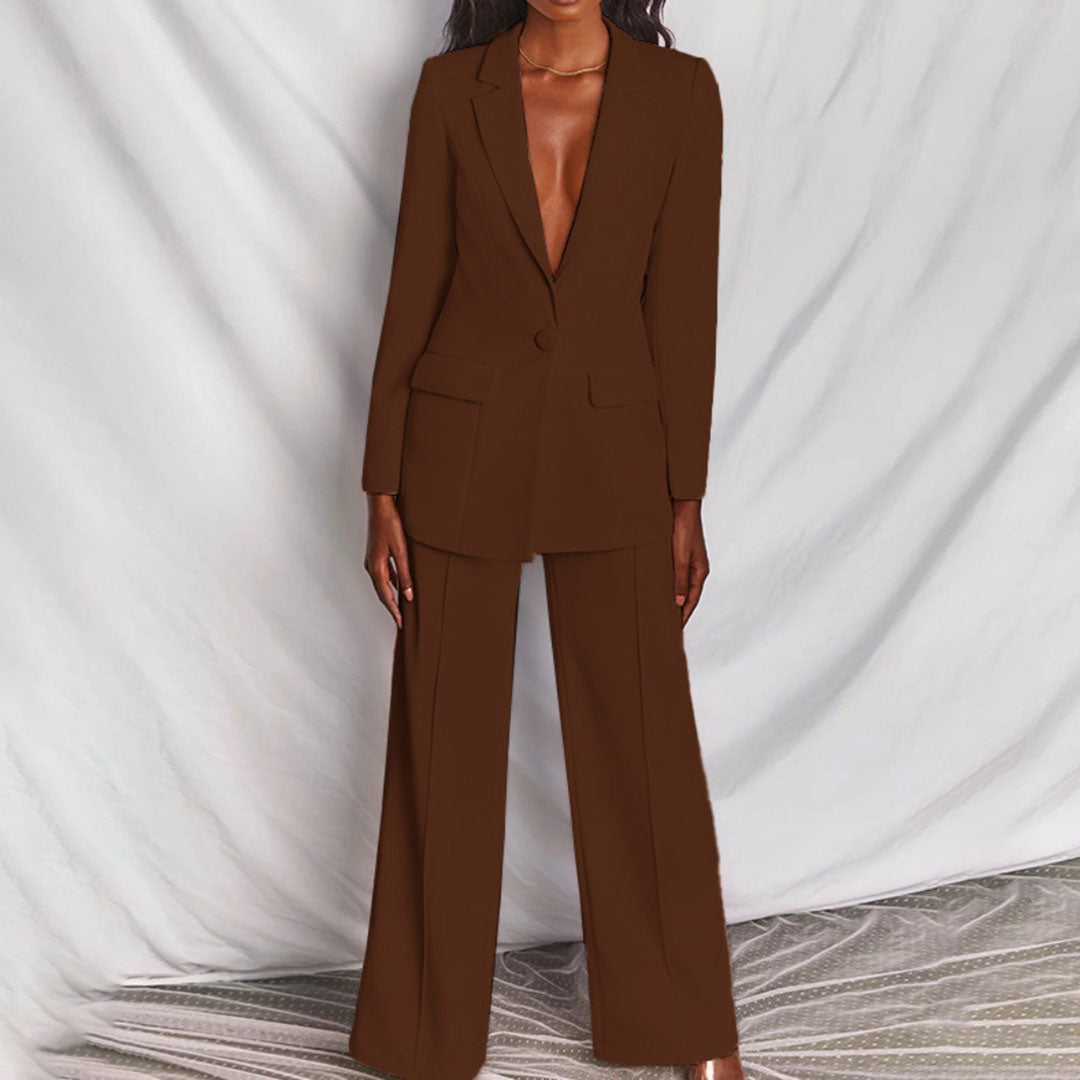 Elegant women's trouser suit featuring a tailored blazer, perfect for sophisticated business workwear.