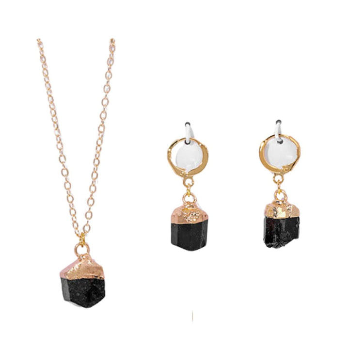Trendy women's crystal jewelry set, a fashionable necklace and earrings accessory.