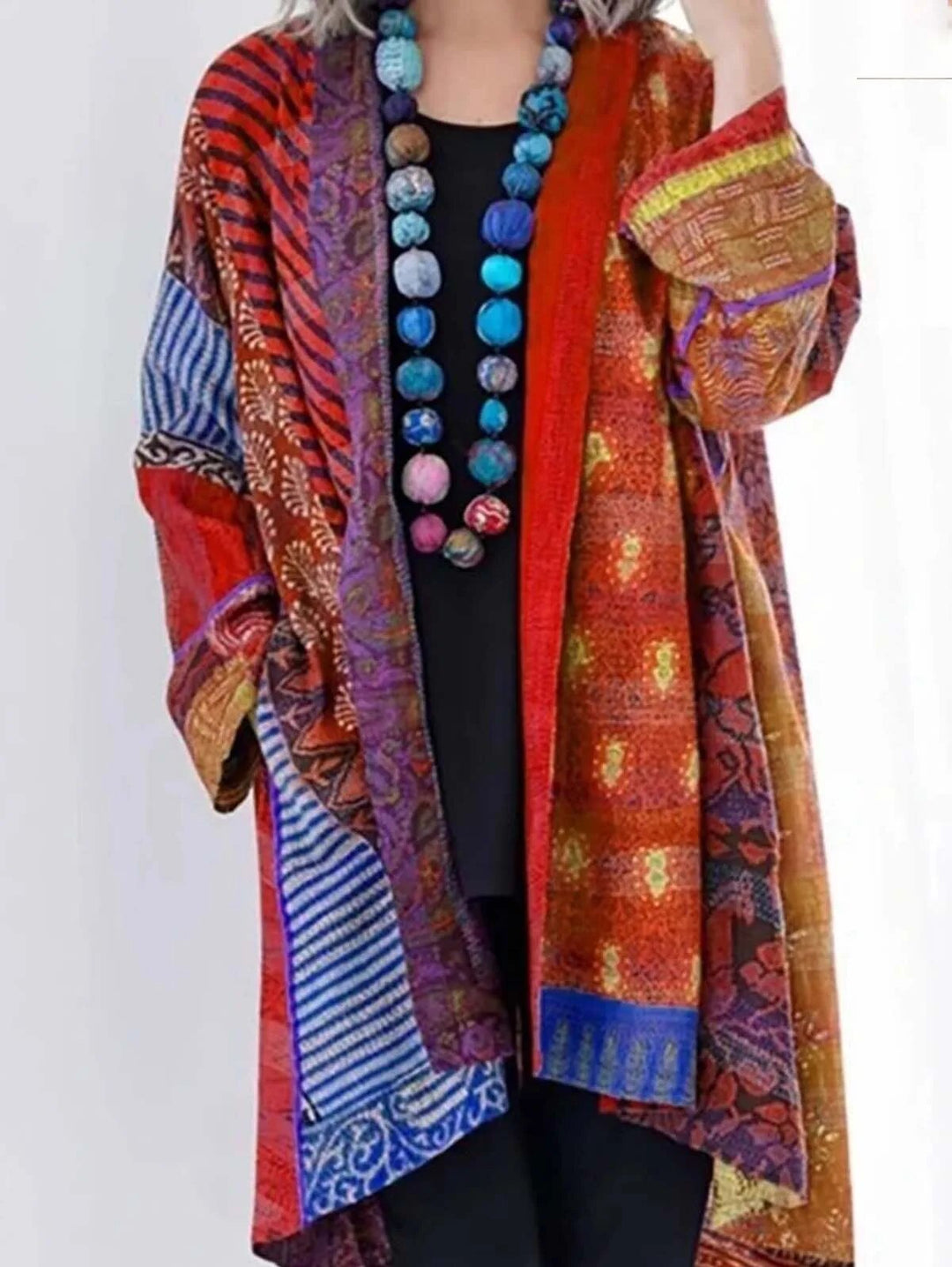 Soft floral knit cardigan vest for women. Luxe, comfortable, and lightweight; ideal for chic spring wear.