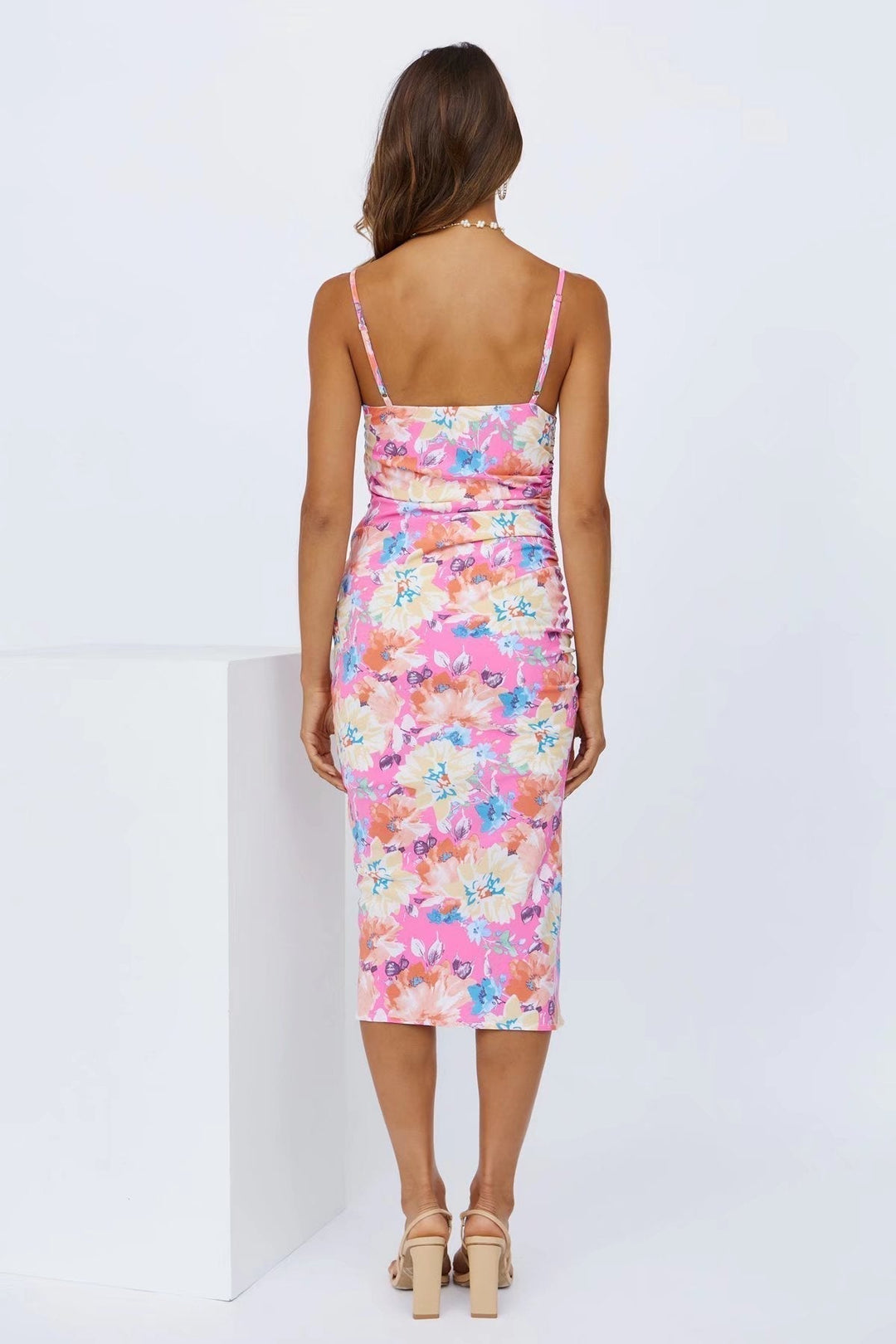 Beautiful women's floral midi summer dress with a captivating print and elegant slit for spring and summer fashion.