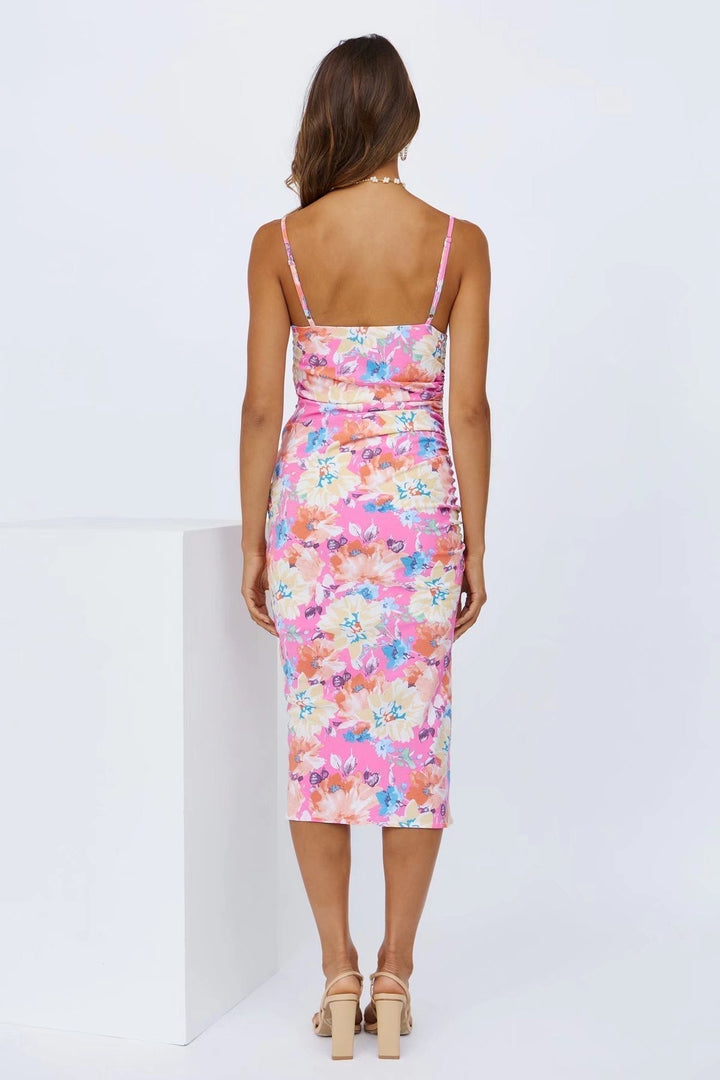 Beautiful women's floral midi summer dress with a captivating print and elegant slit for spring and summer fashion.