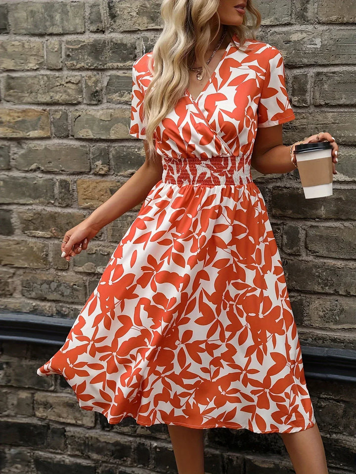 Fresh floral pattern wrap dress for women, an elegant midi silhouette for summer versatility.