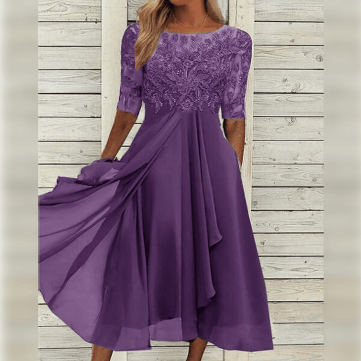 Chic women's lilac fashion dress, a comfortable flowing design for elegant occasion wear.