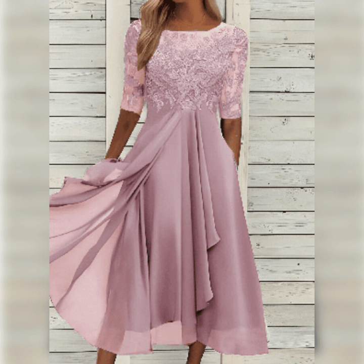 Model wearing a stylish lilac flowing dress, demonstrating its elegant comfort & chic style.