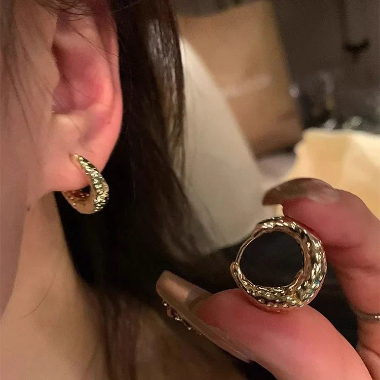 Chic women's silver hoop earrings, a stylish jewelry accessory for an elegant touch.