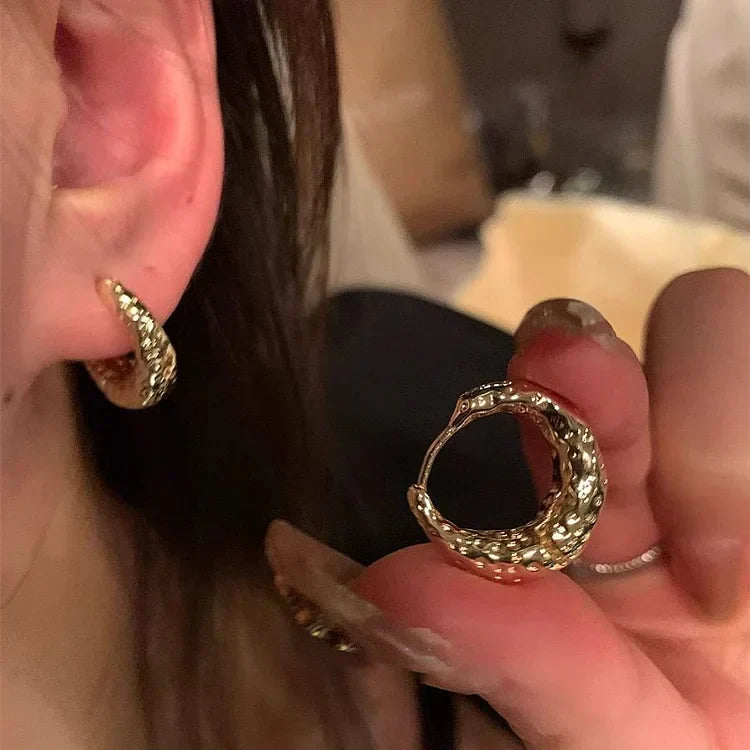 Versatile gold hoop earrings for women, classic jewelry accessories for any elegant look.