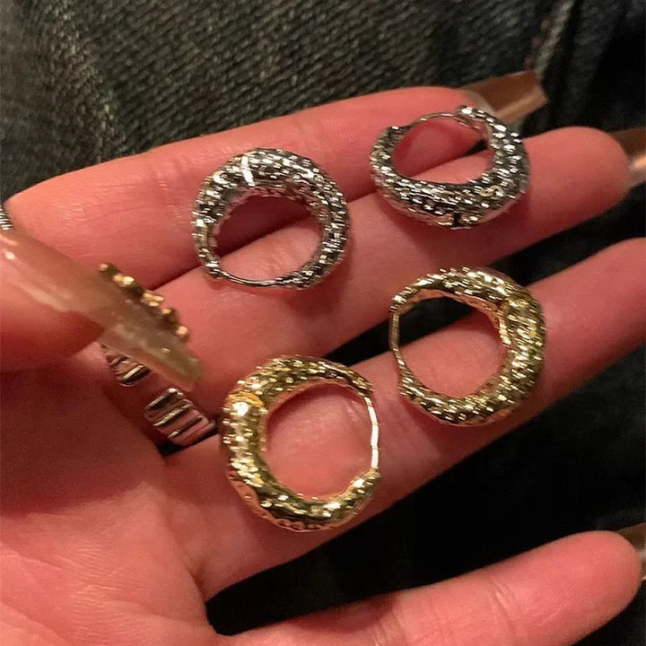 Classic women's elegant hoop earrings, a stylish and versatile jewelry accessory.