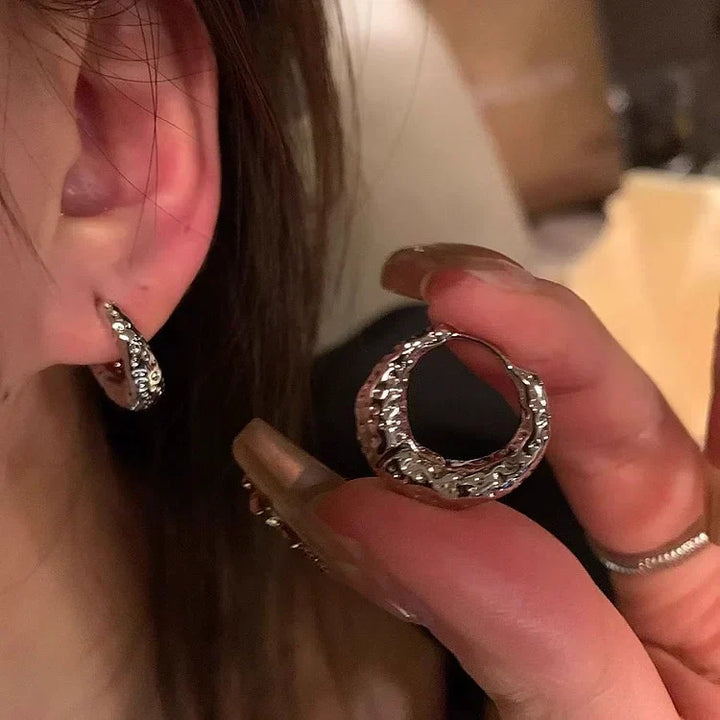 Stylish silver hoop earrings for women, elegant classic jewelry accessories perfect for any occasion.