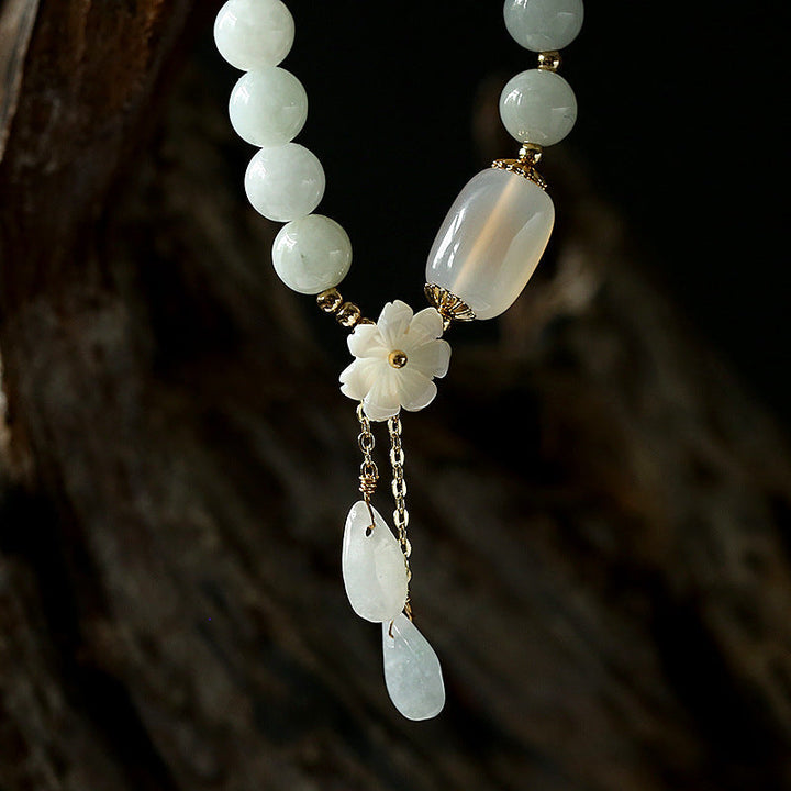 Exquisite women's natural jade and agate stone bracelet. Stylish gemstone jewelry for any occasion.
