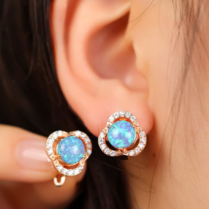 Women's elegant opal & zircon clover leaf stud earrings.