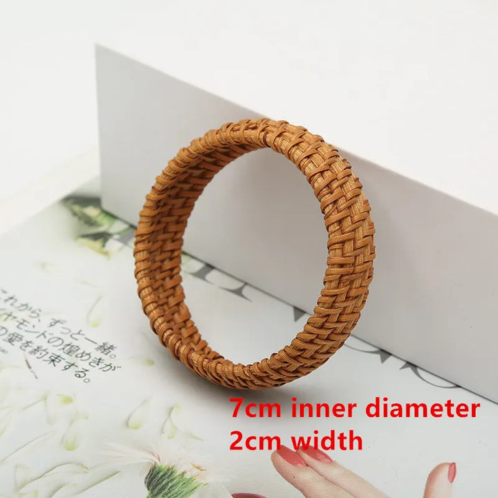 Stylish women's natural rattan bangles, lightweight elegant woven jewelry for everyday wear.