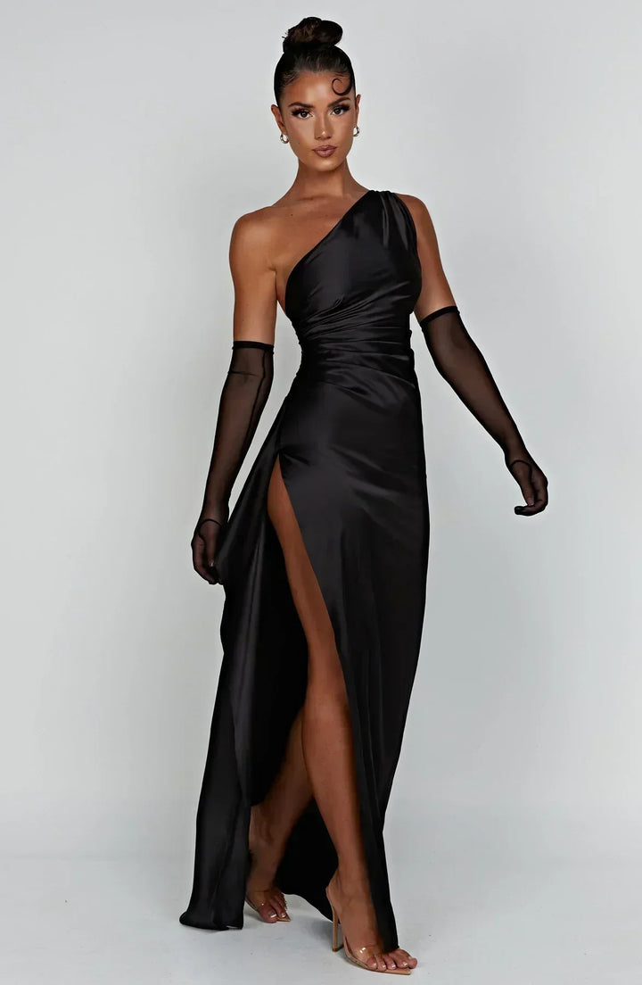 Sophisticated black evening dress, pleated design, with an elegant one-shoulder detail.