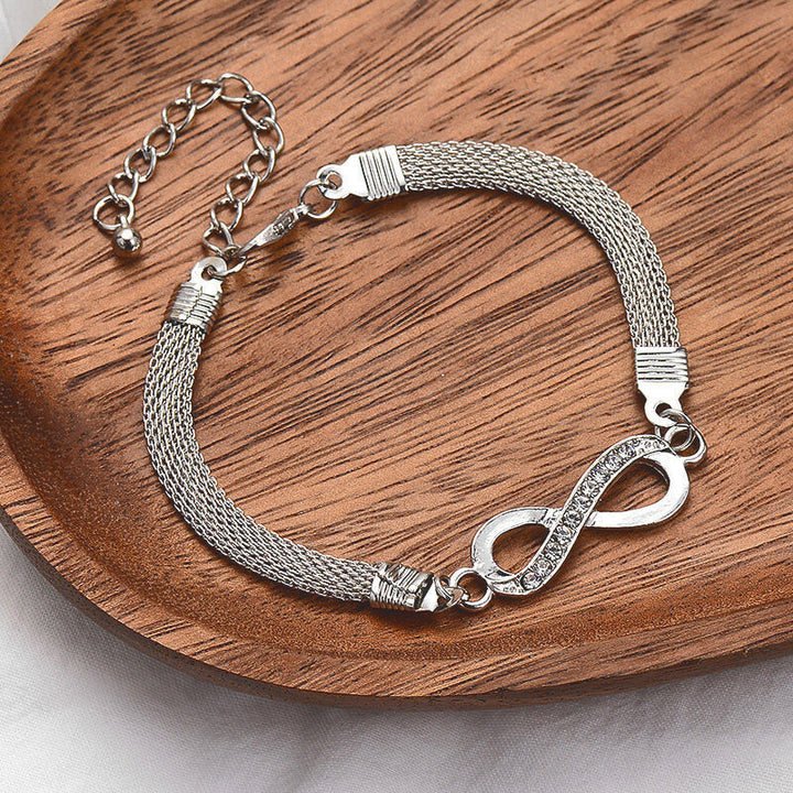 Product image: Sterling silver women's infinity bracelet, elegant design, perfect jewelry accessory.