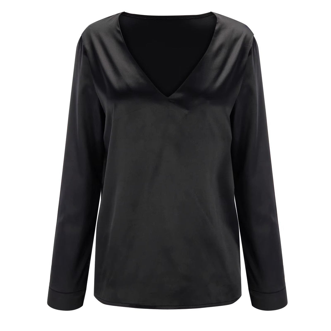 Women's elegant V-neck long sleeve blouse. Chic top, versatile for business style or casual wear.