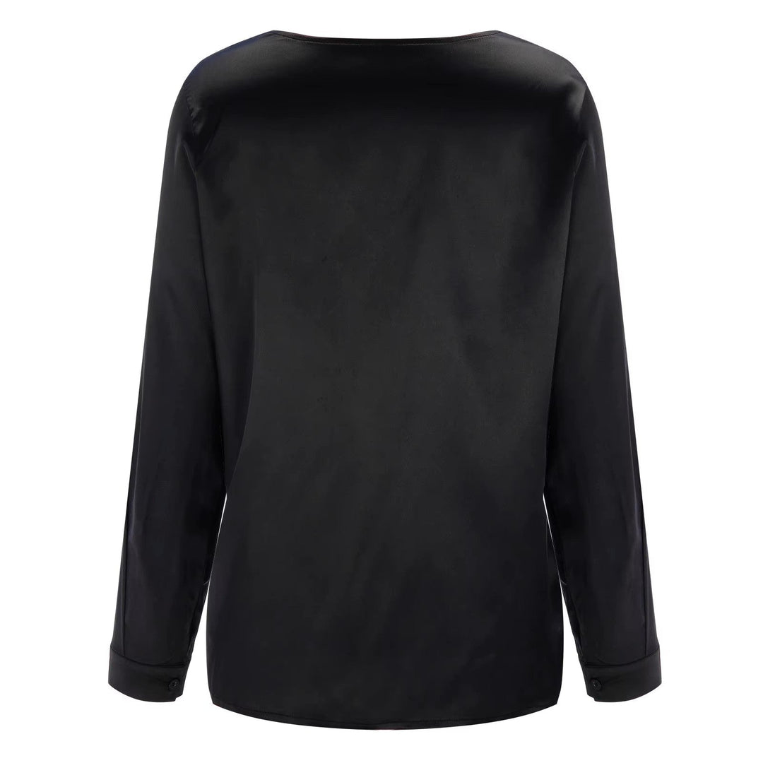Stylish women's V-neck long sleeve blouse. Elegant solid top for versatile business or chic casual fashion.
