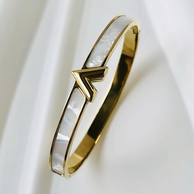 Women's elegant zircon inlay bangle bracelet, perfect for a sparkling accessory.