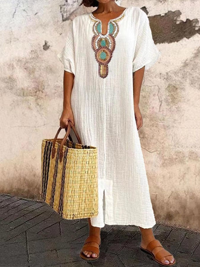 Women's embroidered kaftan maxi dress, breezy summer style. Relaxed fit, flowy design. Perfect long dress for comfort.
