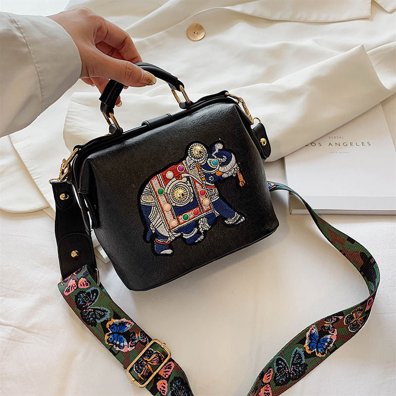 Embroidered mandala pattern on a women's lightweight shoulder bag, ideal for travel and daily adventures