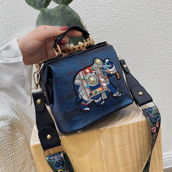 Stylish woman wearing a lightweight embroidered mandala shoulder bag, perfect for boho chic outfit