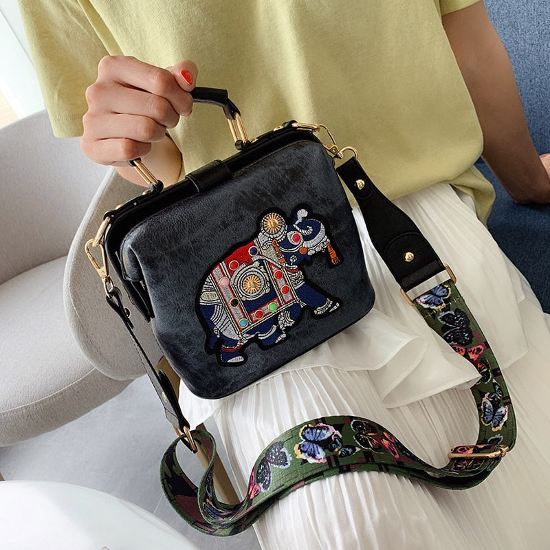 Bohemian shoulder bag featuring a colorful embroidered mandala, ideal as a women's crossbody