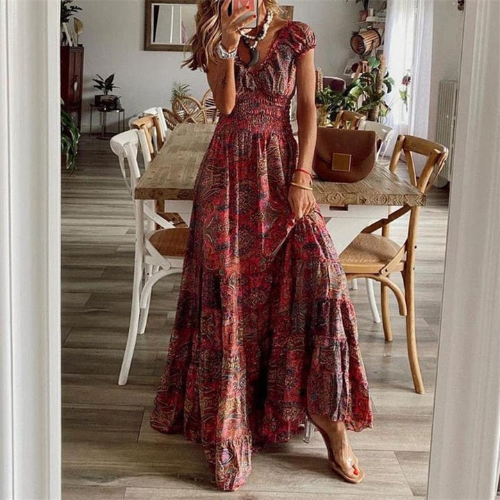 Comfortable women's flowy maxi dress with a stylish ethnic pattern & flattering V-neck. Summer ready.