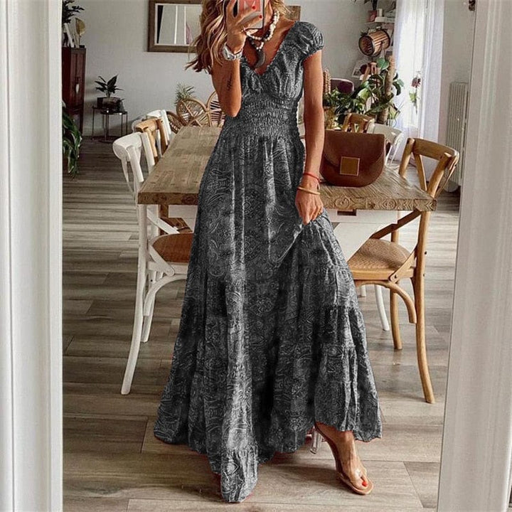 Versatile women's ethnic print V-neck maxi dress, ideal for vacation, parties, or everyday summer wear.