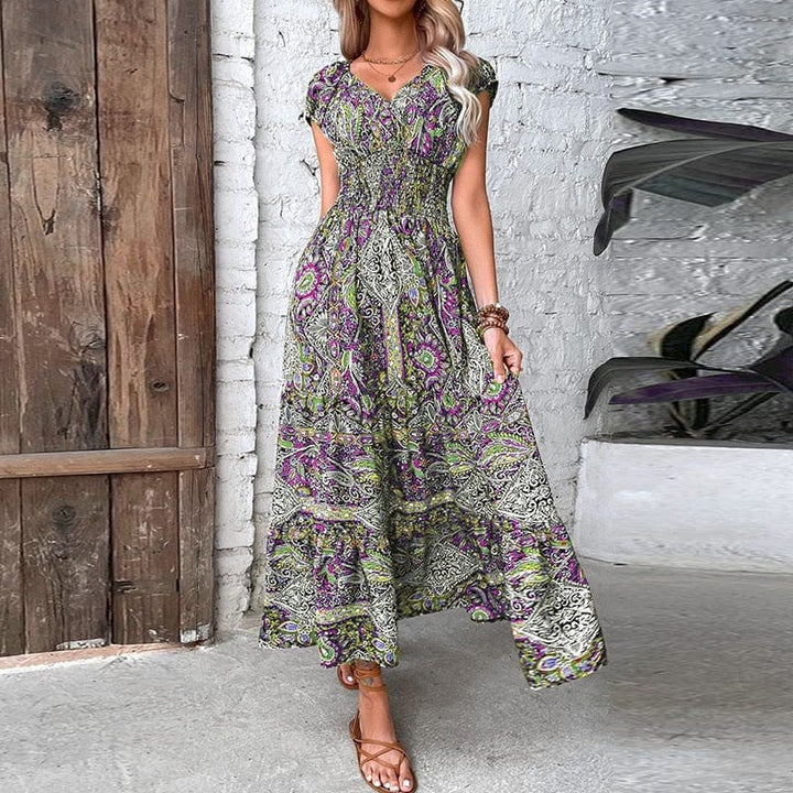 Effortless women's maxi dress. Featuring a chic ethnic print & deep V-neck. Great for summer outings.