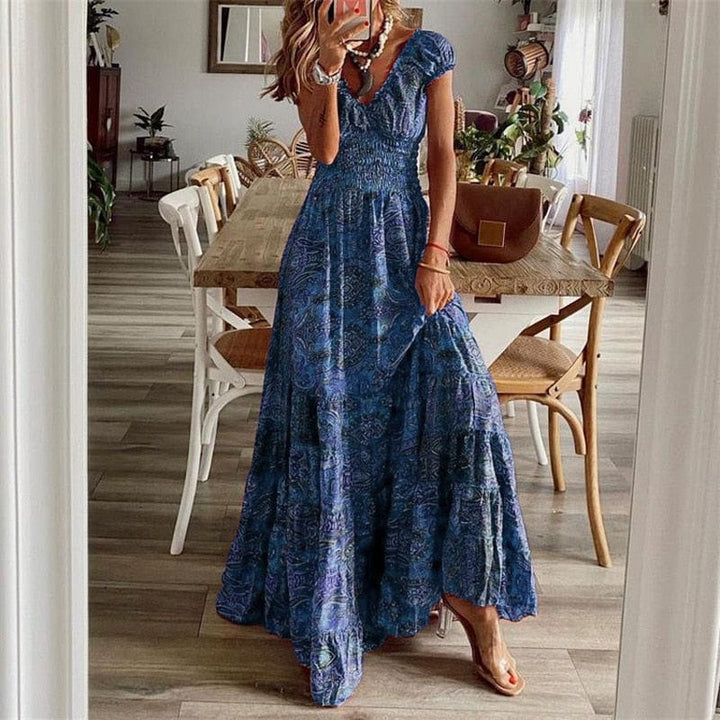 Vibrant ethnic print summer dress. Women's V-neck maxi style, perfect for beach or casual events.