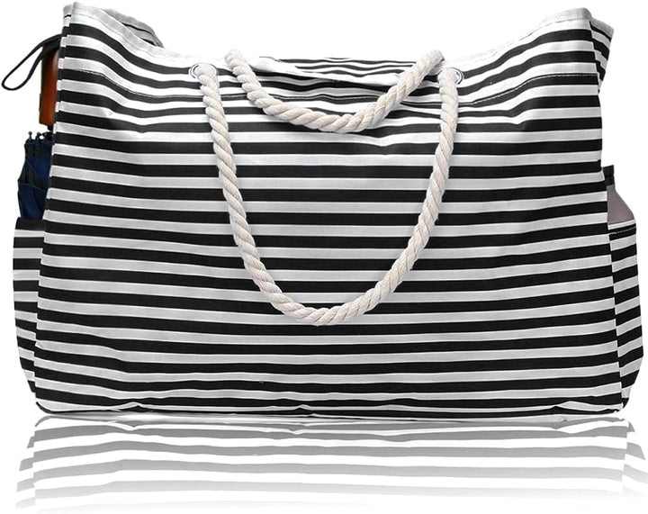 Close-up of the waterproof fabric and sturdy handles of the extra large women's beach tote with bonus pouch.