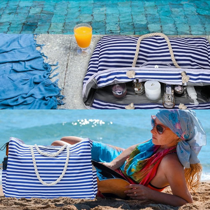 Front view of a striped extra large waterproof beach tote with a bonus pouch. Ideal for women's summer adventures.