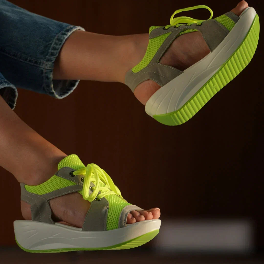 Fashionable Fergie sandals for women, perfect for summer outings, with a comfortable open-toe design.