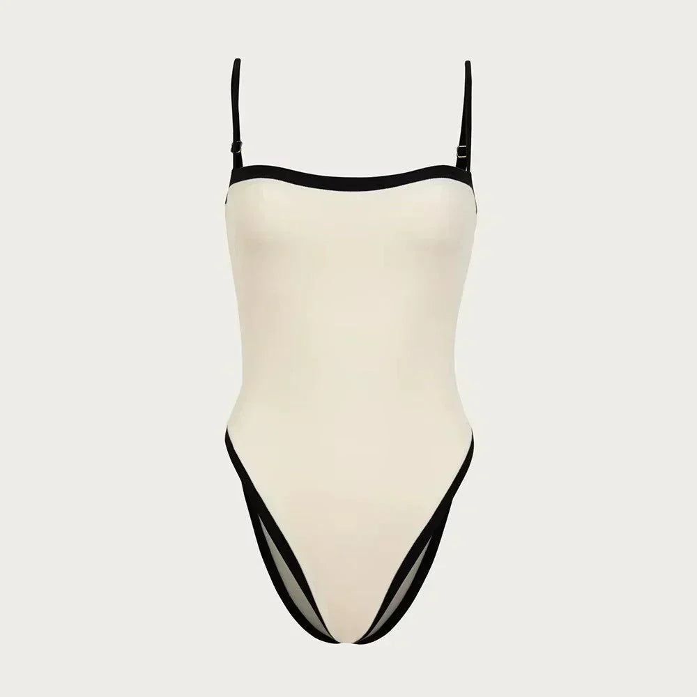Stylish women's one-piece color block swimsuit with a flattering fit, ideal for summer vacation essentials.