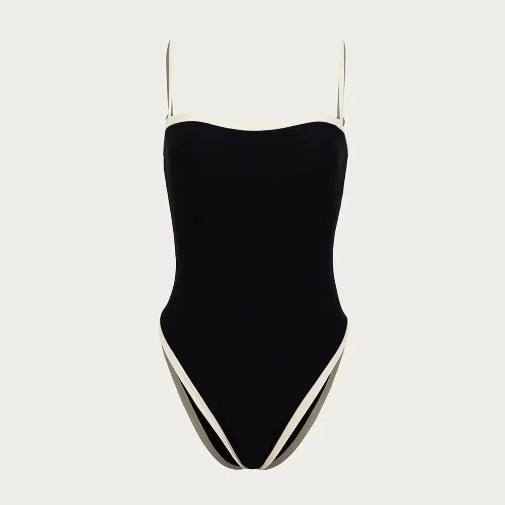 Women's vibrant color block one-piece swimsuit, designed for a flattering summer look at the beach or pool.