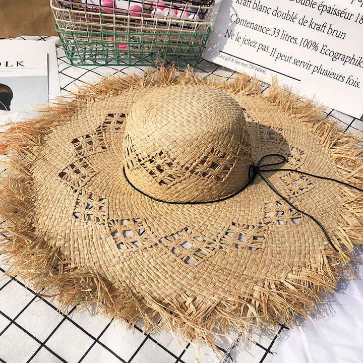 Fashionable women's floppy Panama hat with decorative band, a must-have summer beach accessory