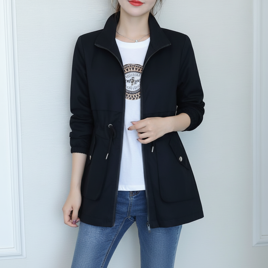 Close-up of Flora women's jacket showing stand-up collar and cotton blend fabric texture
