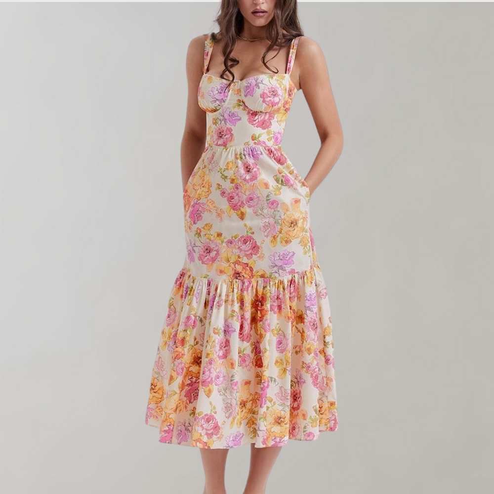 Women's floral flared midi dress with a vibrant print, perfect for summer casual wear