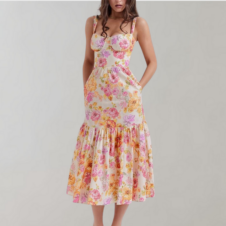 Women's floral flared midi dress with a vibrant print, perfect for summer casual wear