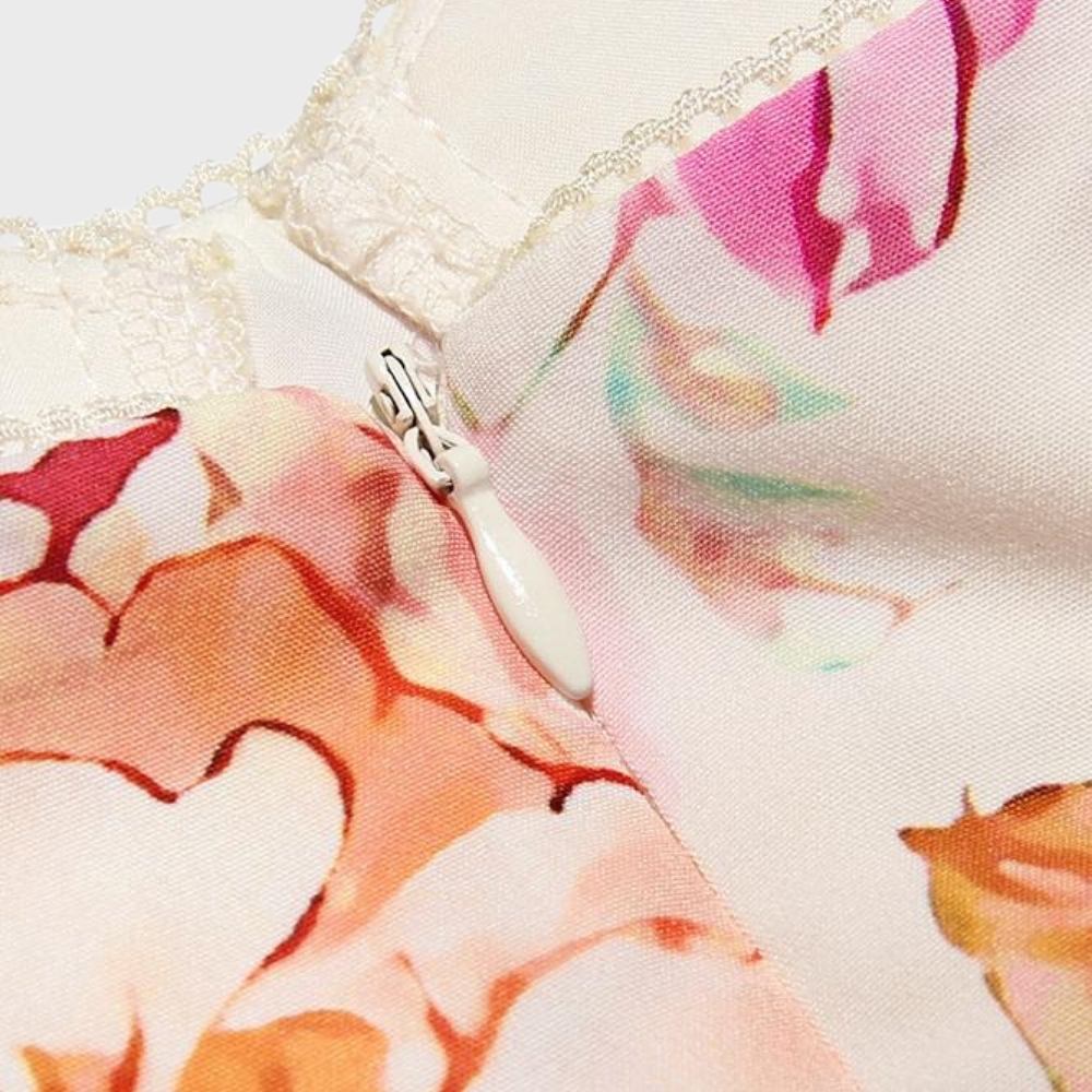 Casual women's summer dress: sleeveless floral midi with a comfortable flared hem