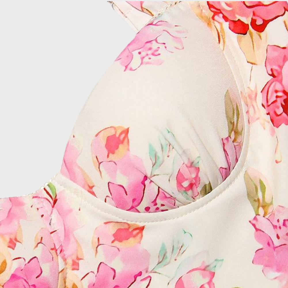 Vibrant floral print on a women's flared midi dress, perfect for warm weather