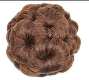 Stylish women's flower hair clip with attached synthetic hair for easy updos.