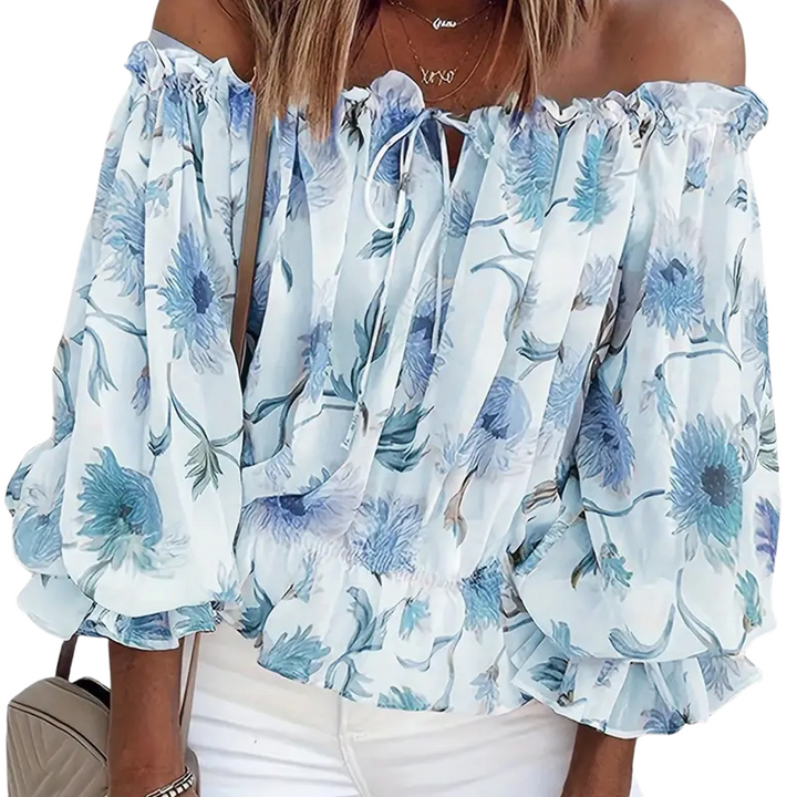 Elegant Fayenne blouse: floral off-shoulder with flowing ruffle details