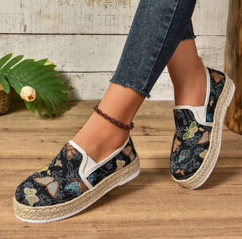 Stylish women's floral platform espadrilles. Perfect summer shoes for casual outings and comfort.