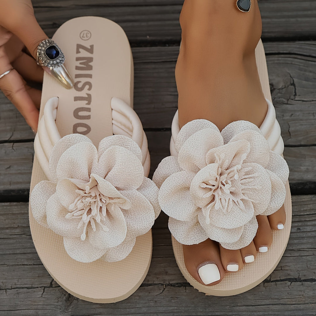 Group of assorted floral women's slippers, different colors & patterns, front studio shot, comfortable